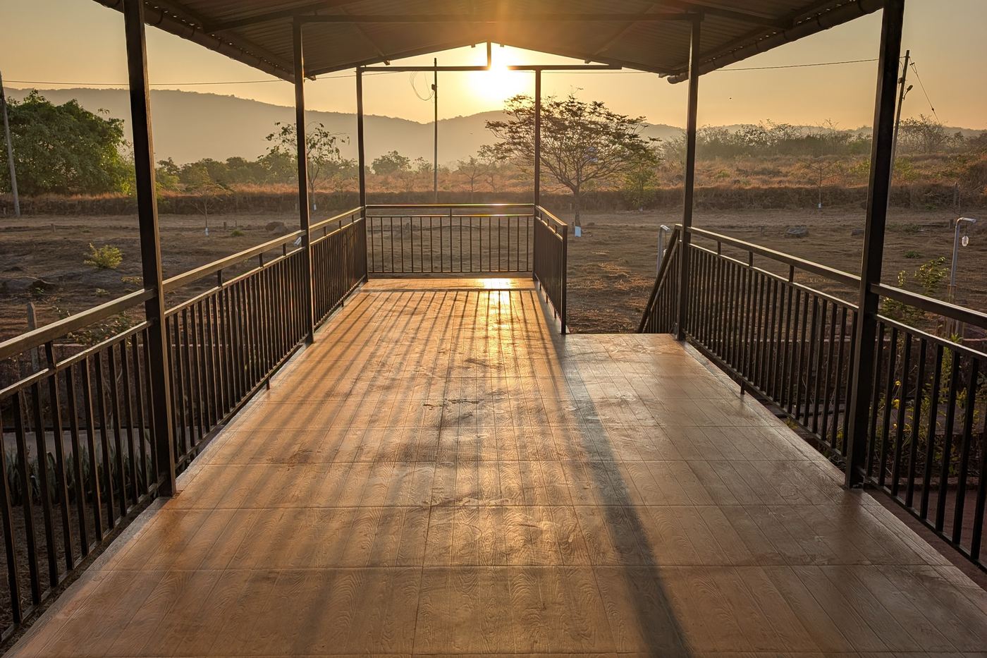 Sunset from the covered verandah at 1000 Trees, Dapoli
