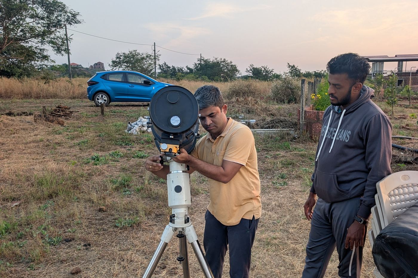 Setting up a telescope for night sky viewing at 1000 Trees